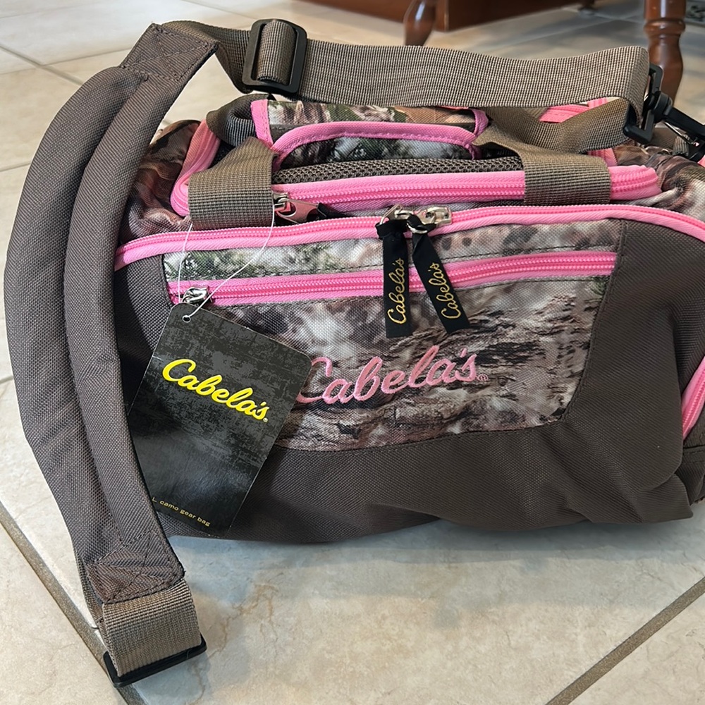 Cabela’s Catch-All camo gear bag. Camo w pink accents